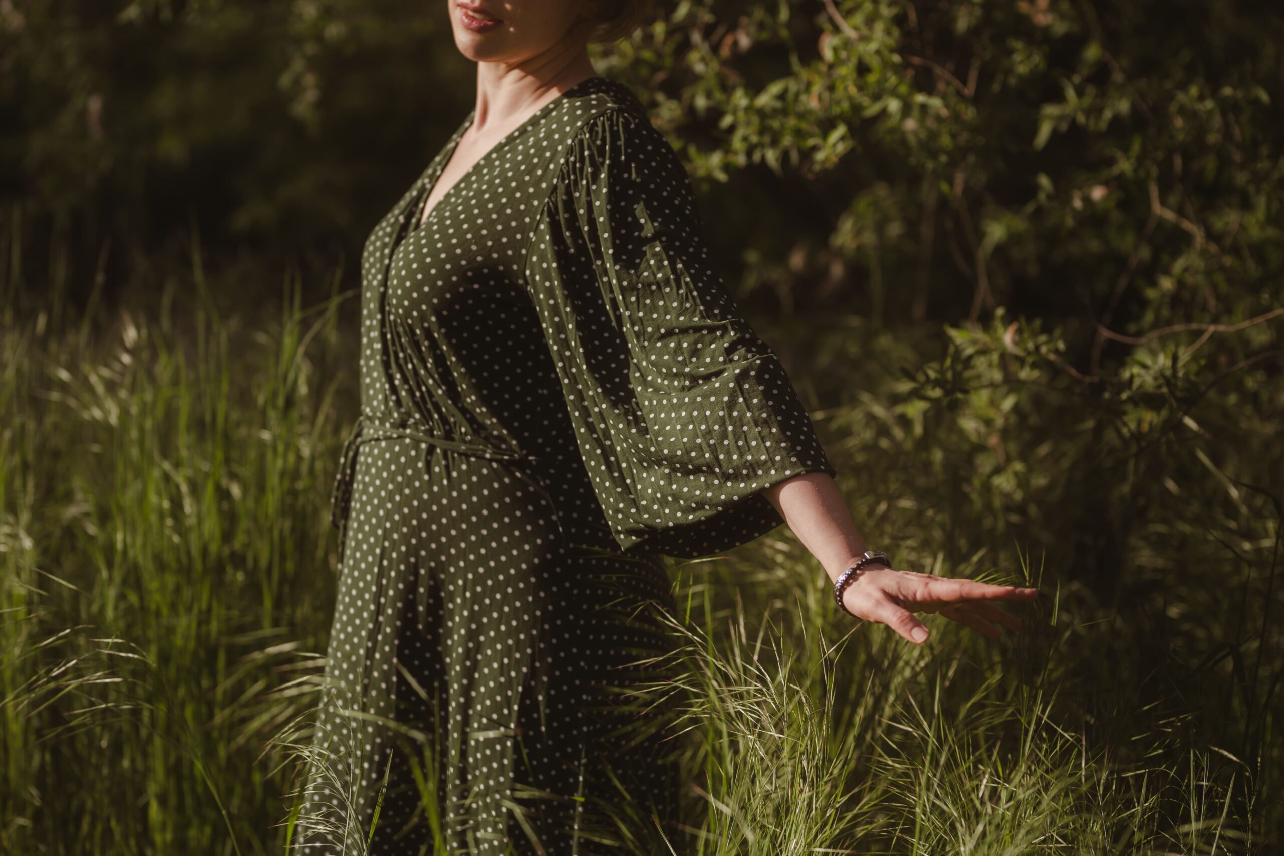 A person among greenery in a moment of peace